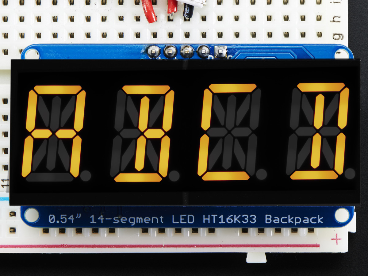 Quad Alphanumeric Display - Yellow 0.54 Digits w/ I2C Backpack