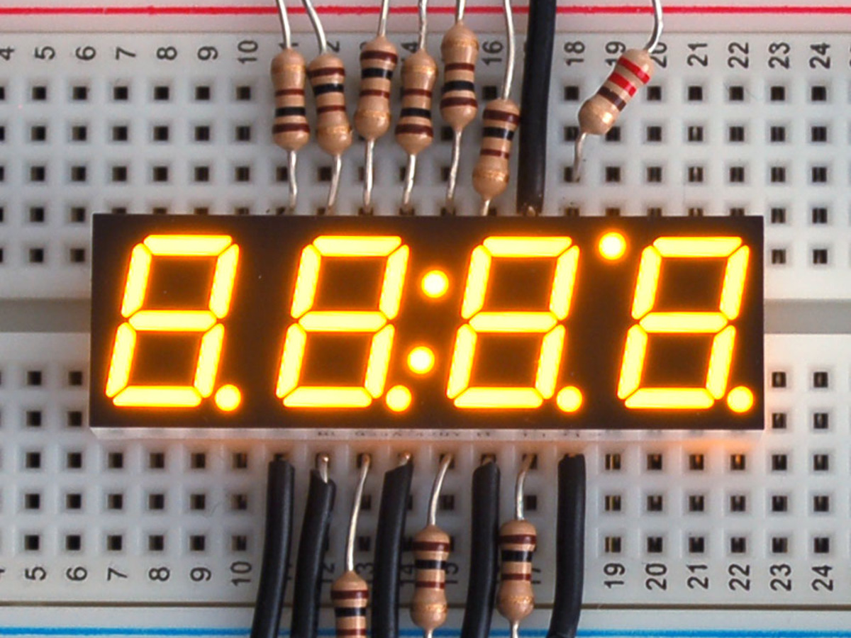Yellow 7-segment clock display - 0.39 digit height